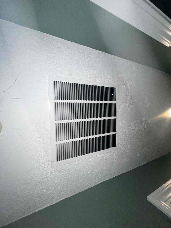 Completed scheduled cooling maintenance for club member. Performed comprehensive system inspection including verification of air flow through return vents and ceiling-mounted ventilation components. Documented equipment condition with photographic records showing proper installation and operation of HVAC registers and diffusers throughout the serviced areas.