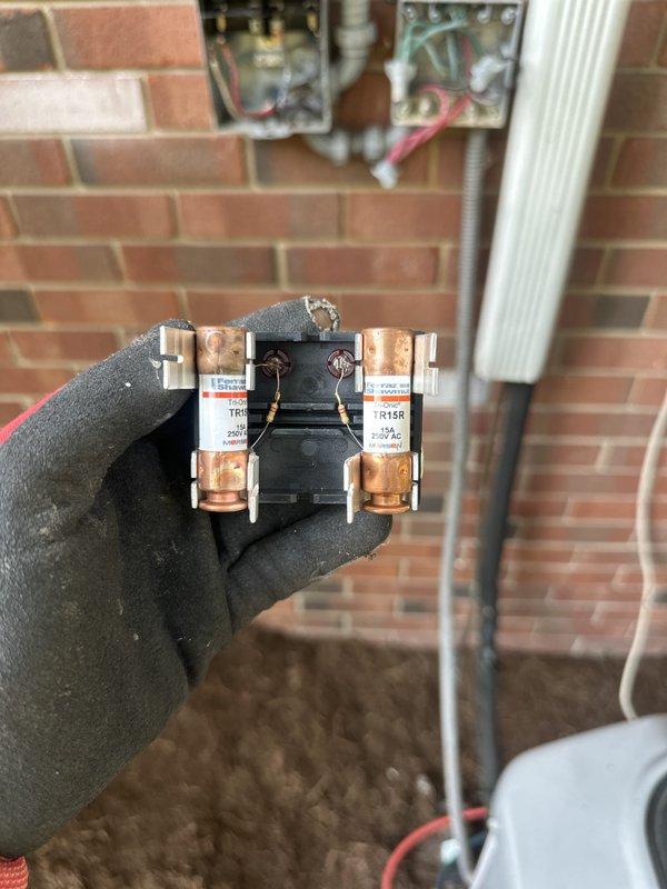 Completed full HVAC system installation as approved return visit. Installed new contactor with proper electrical connections, mounted and wired exterior disconnect box on brick wall exterior, and verified level installation of all components. All electrical connections secured with appropriate color-coded wiring (red, black, and green conductors). System tested and operational upon completion.