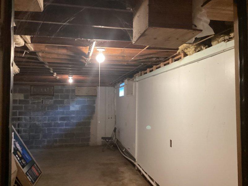 Provided estimate for installation of Daikin mini-split system in unfinished basement area. Assessed installation location, evaluated electrical panel capacity for dedicated circuit requirements, and documented existing conditions including exposed ceiling joists and concrete block construction. Customer to receive detailed proposal for equipment and installation scope.