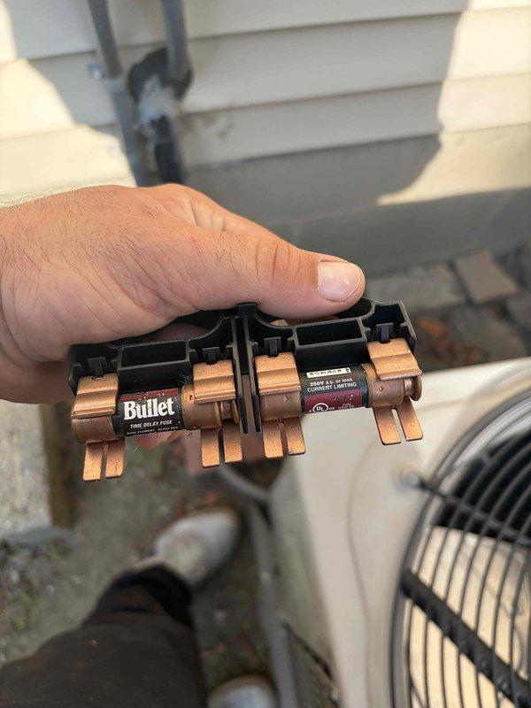 Completed cooling maintenance for club member's air handler system. Performed routine inspection of electrical components including disconnect box and fuses, verified proper amperage ratings on time-delay current-limiting fuses, and documented condition of outdoor condensing unit and electrical connections. All components found operating within normal parameters and system ready for continued service.