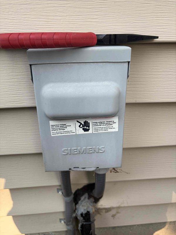 Completed cooling maintenance for club member's air handler system. Performed routine inspection of electrical components including disconnect box and fuses, verified proper amperage ratings on time-delay current-limiting fuses, and documented condition of outdoor condensing unit and electrical connections. All components found operating within normal parameters and system ready for continued service.