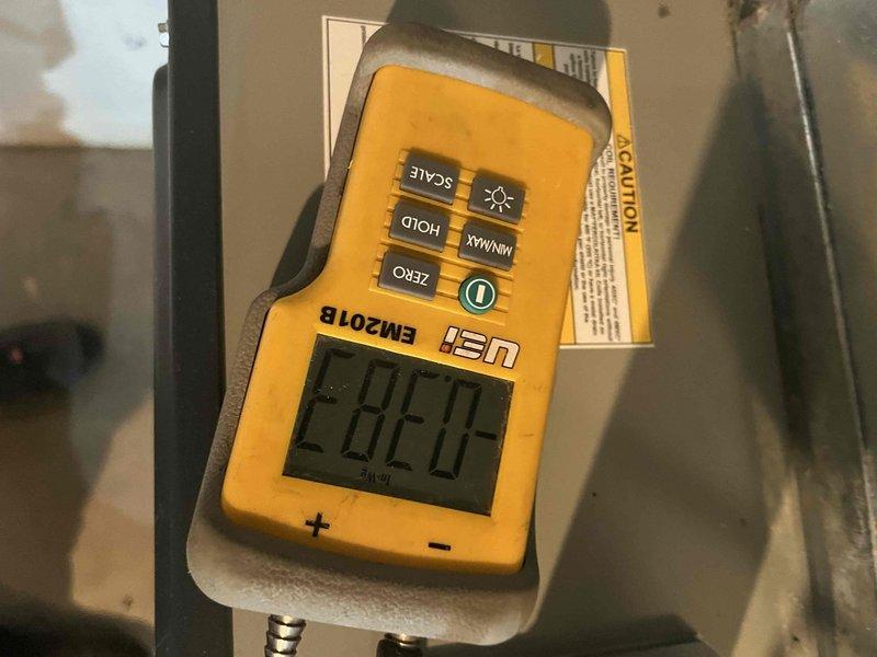 Completed preventive maintenance tune-up on air handler unit. Performed system diagnostics including static pressure measurements (-282.0 Pa recorded) and electrical readings (373.5V AC verified). All operational parameters checked and found within normal specifications.