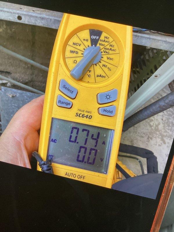 Performed comprehensive preventive maintenance on 18-year-old air conditioning system. Conducted full system inspection including electrical diagnostics with multimeter, measuring amperage draw at 0.74 amps to verify proper compressor operation. Inspected all major components including condenser unit, noting age-related surface oxidation on metal components consistent with system age. System operating within normal parameters with no immediate service needs identified. All routine maintenance tasks completed successfully, unit functioning properly at time of departure.