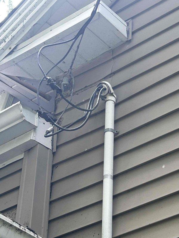 Responded to callback for mini-split system shutting off intermittently since installation with audible beeping alerts. Upon arrival, inspected electrical panel and service disconnect, verifying proper breaker sizing and connections for the mini-split system. Examined exterior line set routing and electrical conduit installation at building exterior. Identified and corrected issue causing system to cycle off and fail to restart properly. System tested and operating normally at time of departure.