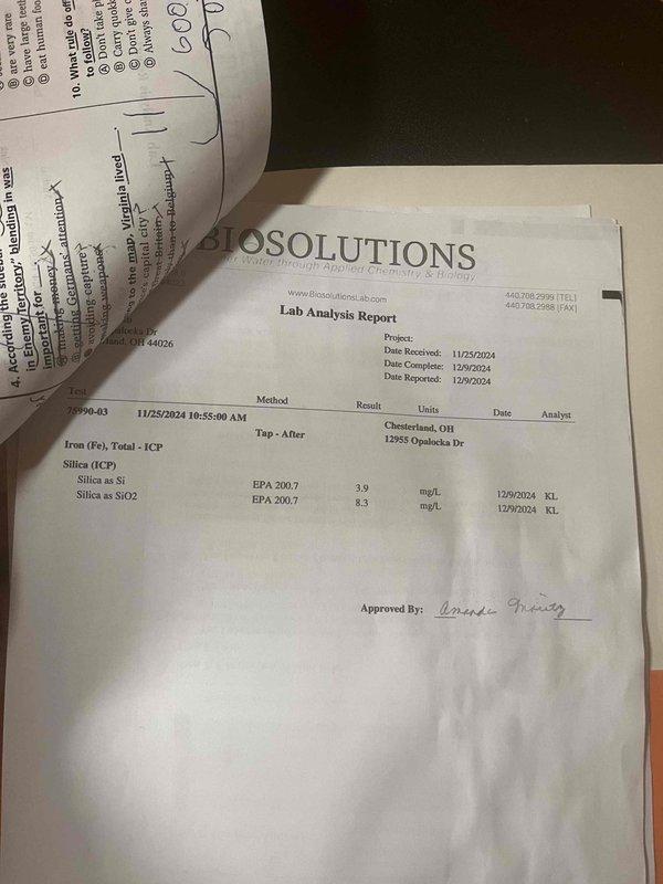 Responded to service call regarding malfunctioning water treatment system. Upon inspection, found water softener with critically low salt level and dirty condition affecting system performance. Added one bag of salt as temporary measure to maintain basic operation until comprehensive diagnostic appointment could be scheduled. Documented existing three-tank water filtration system configuration and reviewed lab analysis report showing elevated iron and silica levels requiring specialized treatment approach for permanent resolution.