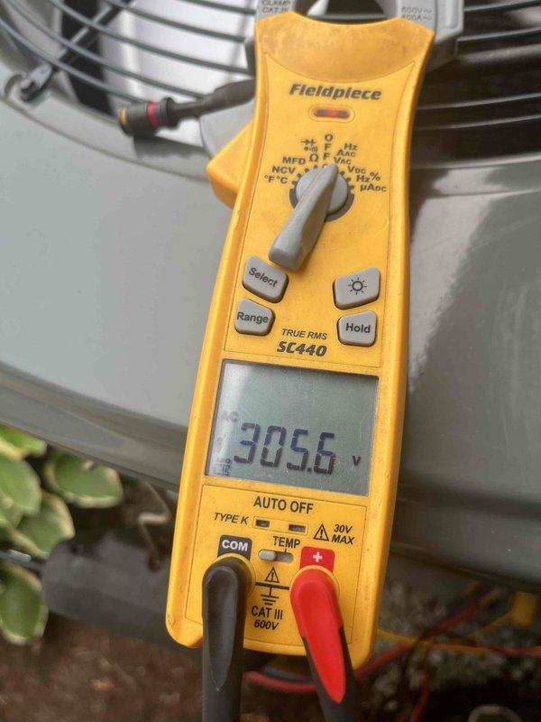 Responded to no airflow issue in main bedroom following recent installation. Verified system electrical parameters with clamp meter, confirming proper voltage at 305.6V and measuring amp draw to ensure equipment operating within specifications. Inspected air handler and ductwork connections related to affected bedroom supply run. System tested and airflow restored to main bedroom register.