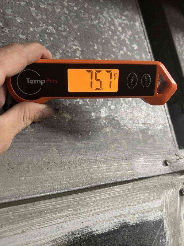Responded to service call for non-functional outdoor unit with fan motor not spinning despite audible compressor operation. Performed diagnostic testing using digital manometer to verify system pressures and conducted temperature measurements at supply registers reading 75.1°F, confirming lack of cooling. Identified failed condenser fan motor preventing proper heat rejection and air circulation through outdoor coil, resulting in no conditioned air delivery to living space.