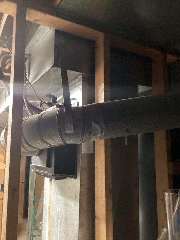 Conducted on-site evaluation for complete HVAC system replacement in residential property. Assessed existing air handler unit installed in basement utility area with black metal cabinet configuration, noting current refrigerant line routing, flexible ductwork connections, and PVC condensate drain system. Documented existing equipment specifications and manufacturer information for replacement sizing calculations.

Evaluated ductwork infrastructure including horizontal cylindrical metal duct runs through unfinished framing areas. Photographed installation conditions and equipment placement to develop accurate replacement proposal. Confirmed service scheduling parameters and established arrival window of 11:00 AM to 1:00 PM to accommodate customer availability requirements. Provided detailed replacement quote covering new equipment specifications and installation scope.