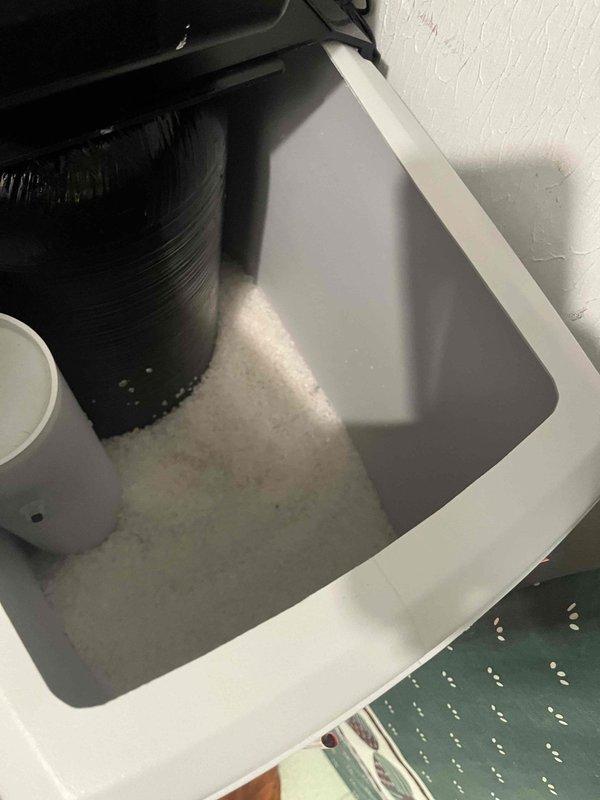 Delivered and installed two bags of water softener salt into the customer's water softening system. Salt was properly loaded into the brine tank to ensure continued operation of the softener unit and maintain optimal water treatment performance.