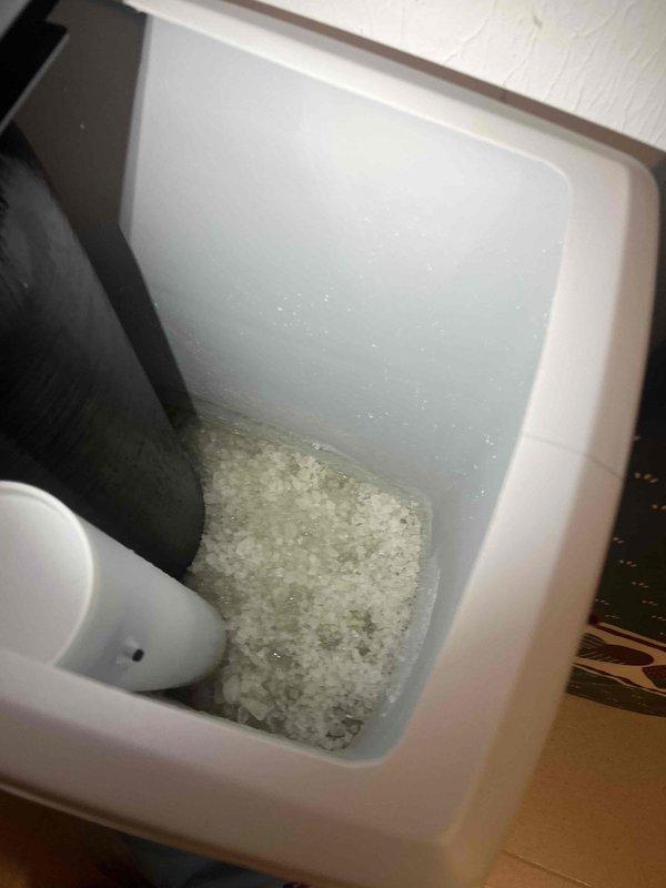 Delivered and installed two bags of water softener salt into the customer's water softening system. Salt was properly loaded into the brine tank to ensure continued operation of the softener unit and maintain optimal water treatment performance.