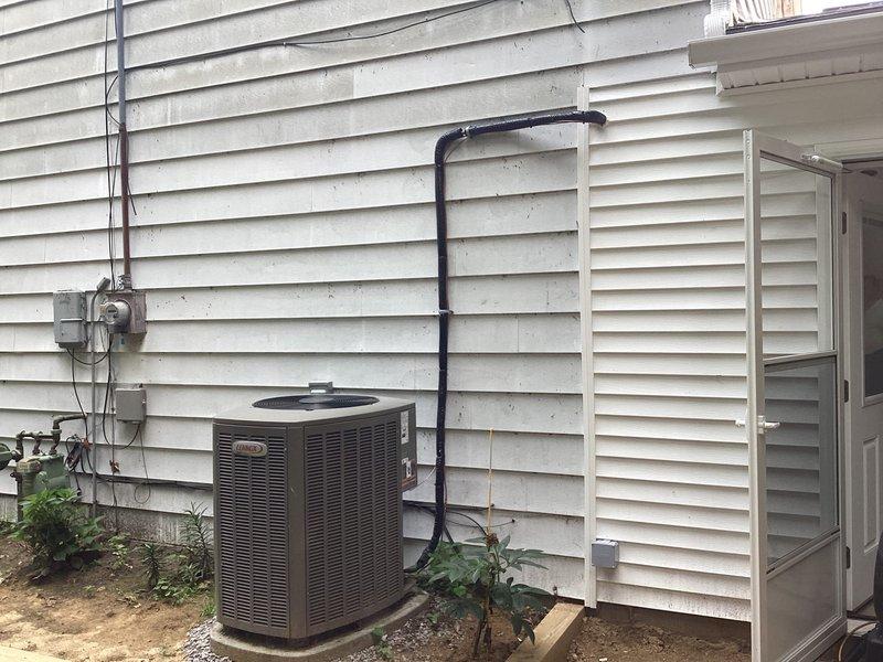 Completed on-site assessment for mini-split system installation at residential property. Evaluated existing HVAC infrastructure, including current condensing unit placement and electrical service configuration. Documented exterior wall conditions, available mounting locations, and optimal refrigerant line routing paths for proposed mini-split installation.