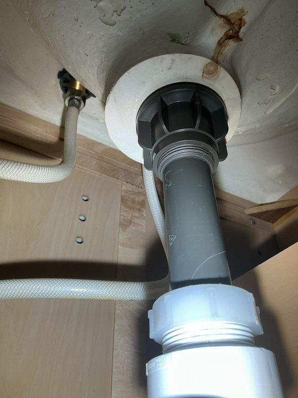 Completed return service to replace defective PCB on tankless water heater system. Installed new control board and performed tankless flush kit maintenance procedure to remove mineral buildup and ensure optimal performance. Inspected toilet tank components and verified proper operation of flush valve assembly and fill valve mechanisms, addressing internal staining and confirming all connections secure.