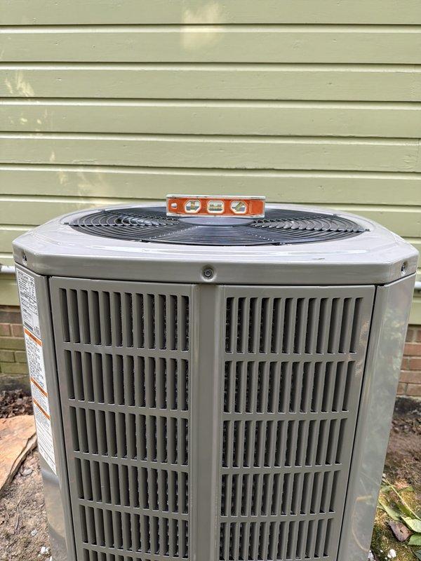 Completed full HVAC system installation including outdoor condensing unit and electrical disconnect. Unit was properly leveled, secured against exterior wall, and all electrical connections were terminated at the fused disconnect box with appropriate gauge wiring. System was tested and verified operational upon completion.