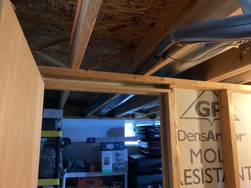 Responded to a flipped lead for an air conditioning system experiencing freezing on both indoor and outdoor refrigerant lines. System had been shut down since the previous night. Performed diagnostic assessment and provided estimate for complete HVAC system replacement. Documented existing equipment configuration including furnace and ductwork in basement utility area. Customer has previously approved estimate for AC disconnect replacement, which remains pending scheduling.