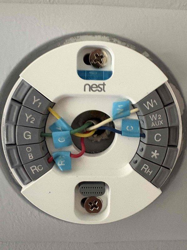 Responded to service call for AC blower motor failure with error code 41 displayed on 20-year-old furnace paired with 10-year-old outdoor condensing unit. Performed diagnostic evaluation of HVAC system, confirmed blower motor inoperative and noted motor does not utilize a capacitor. Documented existing equipment configuration including furnace in basement location, Nest thermostat wiring connections, and overall system condition. Provided comprehensive estimate for complete HVAC system replacement due to age of existing equipment and cost-effectiveness of full system upgrade versus component repair.