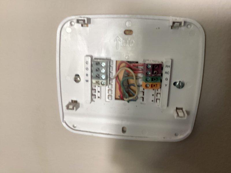 Conducted HVAC system evaluation for cooling inadequacy complaint where indoor temperatures reached 78 degrees during peak heat conditions. Inspected thermostat wiring and terminal connections, documented existing ductwork configuration including galvanized metal supply and return ducts with zone damper assembly, and assessed copper refrigerant line connections with service valve. Provided comprehensive replacement estimate based on system performance deficiencies and equipment age considerations for residential comfort improvement.