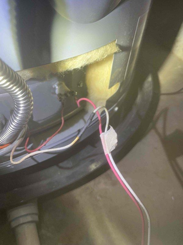 Responded to service call for recurring water leak originating from second floor plumbing and extending to basement, as well as extinguished pilot light on tanked water heater. Upon arrival, inspected previously repaired pipe showing continued leak evidence, with visible water damage and staining on ceiling and wall surfaces. Assessed water heater unit, accessed internal components, and successfully relit pilot light following proper safety protocols. Documented conditions with photos showing water damage patterns and internal water heater components for further evaluation of persistent leak source.