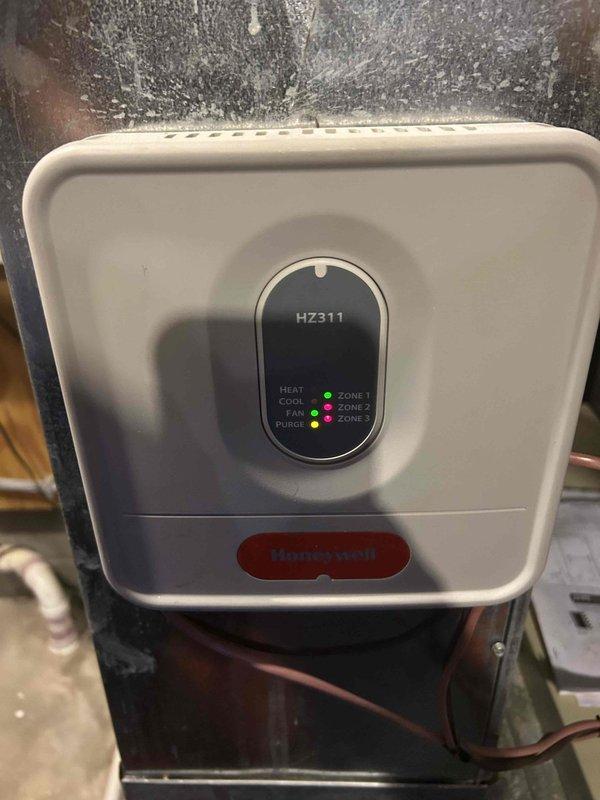 Responded to complaint of second floor AC unable to cool below 76 degrees. Inspected HZ311 zone control system and associated HVAC equipment. Replaced air scrubbers per previously provided quote and verified proper operation of multi-zone cooling system.