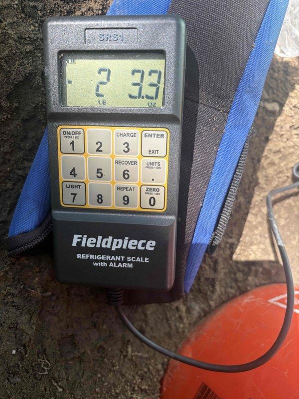 Returned to property to reconnect and charge air conditioning system that had been disconnected since May per previous estimate. Successfully reconnected refrigerant lines, evacuated system to proper vacuum levels, and charged unit with appropriate refrigerant using manifold gauges and refrigerant scale to manufacturer specifications.
