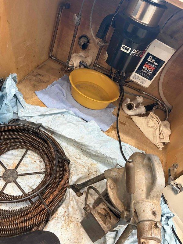 Responded to clogged kitchen sink that remained blocked after homeowner attempted to clear with 25-foot auger. Upon arrival, assessed the drainage system and utilized professional-grade drain cleaning equipment to successfully remove the obstruction. Restored proper water flow and drainage function to the kitchen sink, tested system operation, and confirmed complete resolution of the blockage.