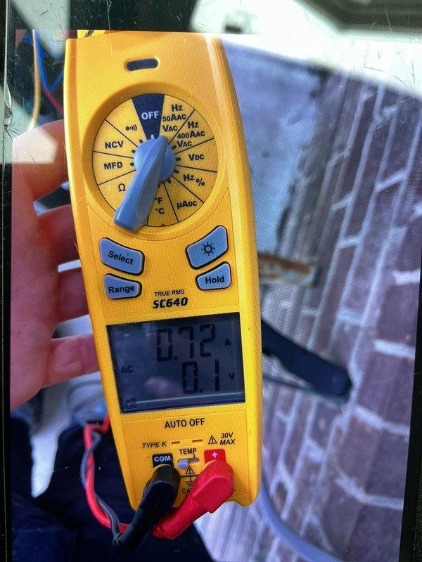 Completed cooling maintenance per club membership plan. Performed electrical diagnostics using digital multimeter to verify system amperage and capacitance readings on HVAC unit, with measurements indicating 490 microfarads and 0.3 amps. Discussed dual-zone system configuration and requirements with property owner as requested.