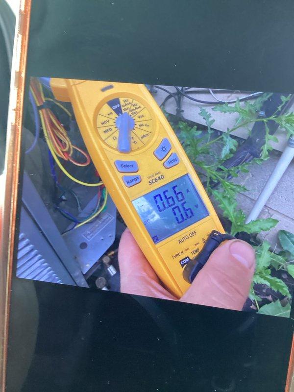 Completed comprehensive club maintenance visit performing routine tune-up on both air conditioning and furnace systems. Conducted full system diagnostics with both units operating within normal parameters and no deficiencies noted. Inspected outdoor AC unit including capacitor testing with multimeter confirming proper electrical readings, verified all wiring connections secure, and documented equipment condition with both systems functioning properly at time of service.