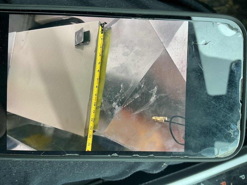 Completed warranty service call for thermostat issue. Accessed air handler unit and documented interior ductwork measurements using measuring tape to verify proper clearances and component positioning. Inspected reflective insulation liner condition within ductwork system and confirmed wiring connections were secure with proper wire management in place.