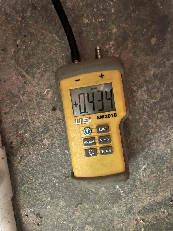 Completed HVAC maintenance club visit and enrollment. Performed system diagnostics using digital manometer to measure static pressure reading of +0.74 inches water column. Utilized multi-function digital analyzer to assess airflow parameters and temperature differentials across the system. Documented equipment conditions and readings with photographs for service records.