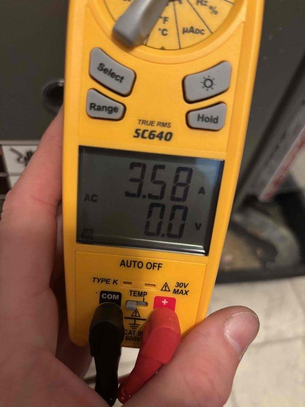Completed cooling maintenance club visit on system prior to customer's extended travel. Inspected dual-run capacitor showing 40/5 MFD rating with visible corrosion on terminal assembly and upper rim; documented condition with photos. Measured and recorded compressor amperage at 3.58A using digital multimeter to verify system performance within acceptable operating parameters.