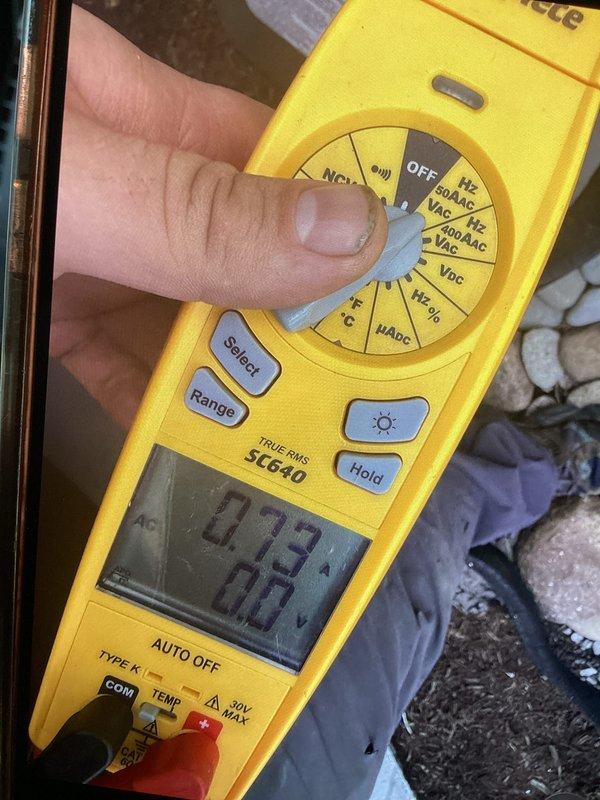 Performed cooling maintenance on upstairs air handler that was struggling to maintain temperature during extreme heat conditions. Inspected electrical components using clamp meter, verified capacitor connections and wiring integrity, and assessed internal control system components with access panel removed for thorough evaluation.