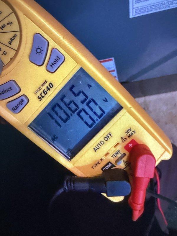 Completed club membership enrollment and performed HVAC system inspection. Measured system temperatures using digital multimeter, recording readings of 705.72 and 23.5 degrees. Documented evaporator coil condition, noting accumulated dust and debris on fins requiring future cleaning attention.