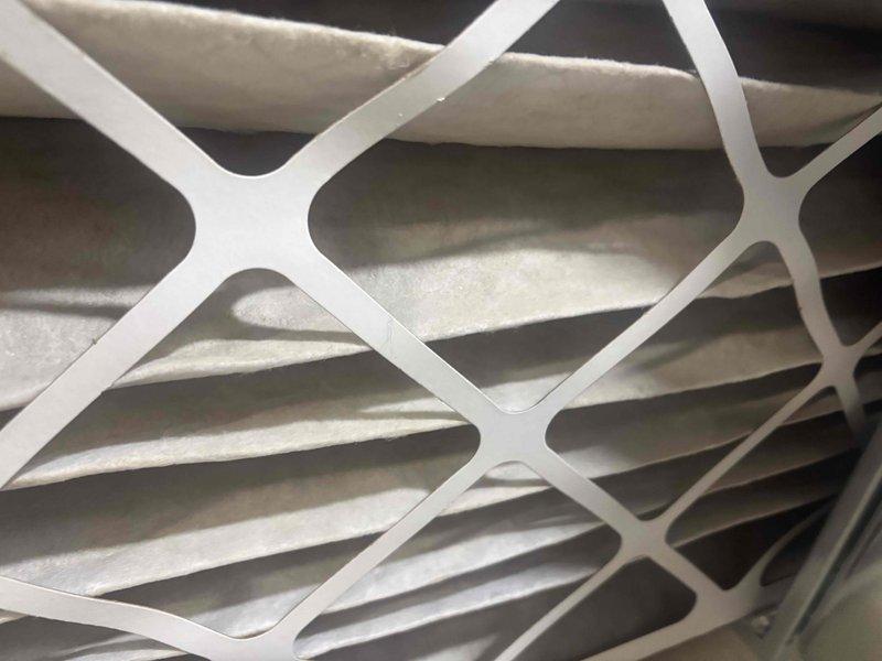 Completed cooling maintenance club visit and renewed membership plan. Performed system diagnostics using Fieldpiece SL640 meter to verify electrical readings and amperage draw, confirming proper operation. Inspected air filtration system and documented clean filter condition with adequate airflow.