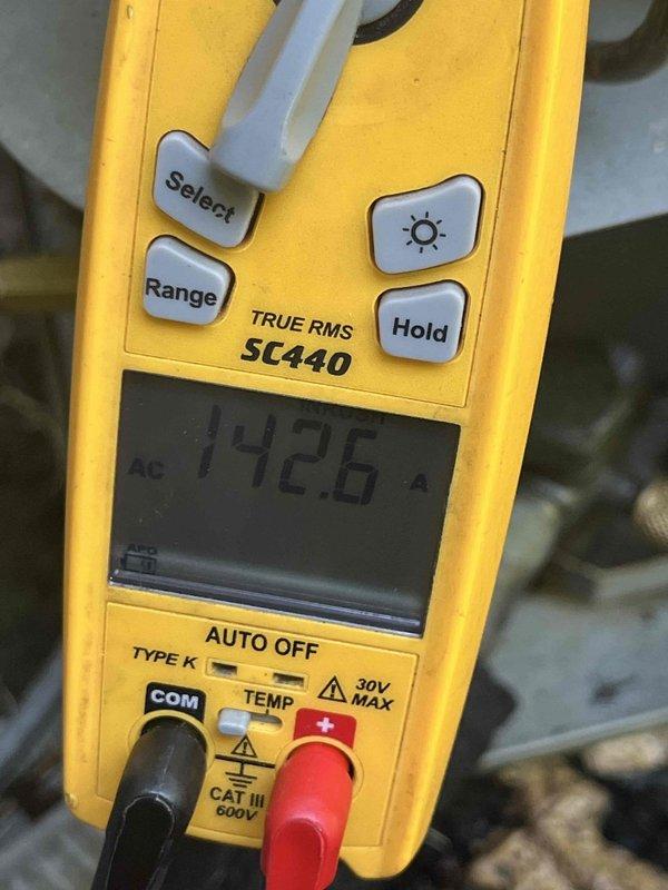 Completed comprehensive air conditioning tune-up and system inspection in response to high electric bill concerns. Performed standard maintenance procedures on outdoor condensing unit, including electrical diagnostics with amperage readings measuring 142.6 amps AC to verify compressor performance and identify potential efficiency issues. Cleaned and inspected all accessible components, verified proper system operation, and provided recommendations for optimal energy efficiency.