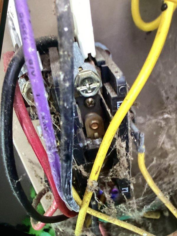 Completed routine cooling maintenance visit for club member. Inspected outdoor unit electrical components, noting age-related wear, dust accumulation, and minor corrosion on capacitor assembly and wire connections. Captured refrigeration diagnostics showing R-22 system operating with suction pressure at 69.9 psig, liquid pressure at 211.8 psig, and superheat reading of 25.4°F, indicating acceptable refrigerant charge and system performance.