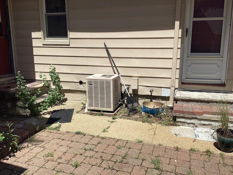 Responded to furnace replacement inquiry due to significant water leakage observed in basement mechanical room. Assessed existing furnace and water heater system, documented moisture damage on concrete floor surrounding equipment, and provided customer with replacement options for leaking furnace unit.
