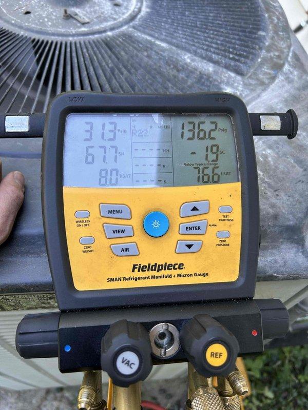 Responded to no cooling complaint on residential air conditioning system. Upon arrival, found unit partially disassembled by homeowner during attempted cleaning. Reassembled outdoor condenser unit, verified proper electrical connections, and performed system diagnostics using refrigerant manifold and micron gauge. Checked system pressures, temperatures, and superheat/subcooling values to confirm proper refrigerant charge and system operation. Unit restored to normal cooling operation with all readings within manufacturer specifications.