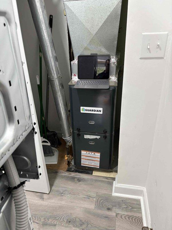 Conducted comprehensive HVAC system assessment for residential property with existing 3-year-old Guardian furnace located in utility closet. Evaluated current heating system configuration and attic space infrastructure to provide estimate for adding new air conditioning system to property currently without cooling capability.
