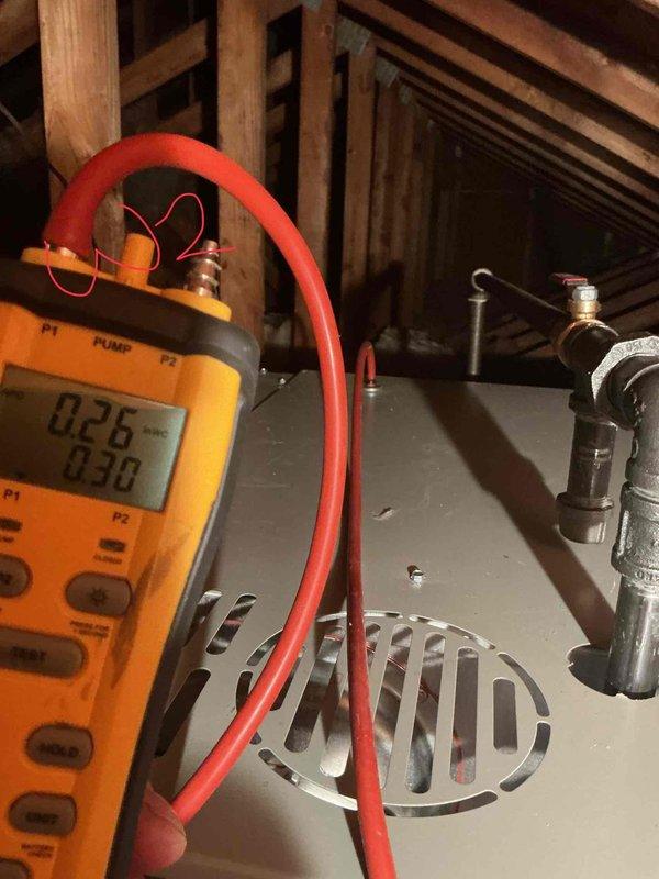 Performed system start-up and diagnostic testing on recently installed air conditioning system. Customer reported intermittent clanking noise on one occasion but unit has operated normally since. Conducted comprehensive performance verification using digital manifold gauges and dual-port manometer to measure system pressures, refrigerant levels, and airflow parameters. All readings within manufacturer specifications, system cooling effectively with no abnormal sounds or operational issues detected during inspection.