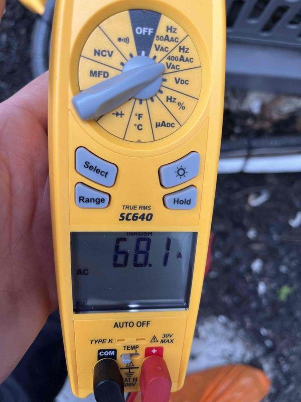 Completed scheduled cooling maintenance member visit. Performed diagnostic testing of HVAC system using digital multimeter, recording temperature readings of 68.1°F and electrical measurements showing 0.60 amps and 0.2 volts at various test points to verify proper system operation and component functionality.
