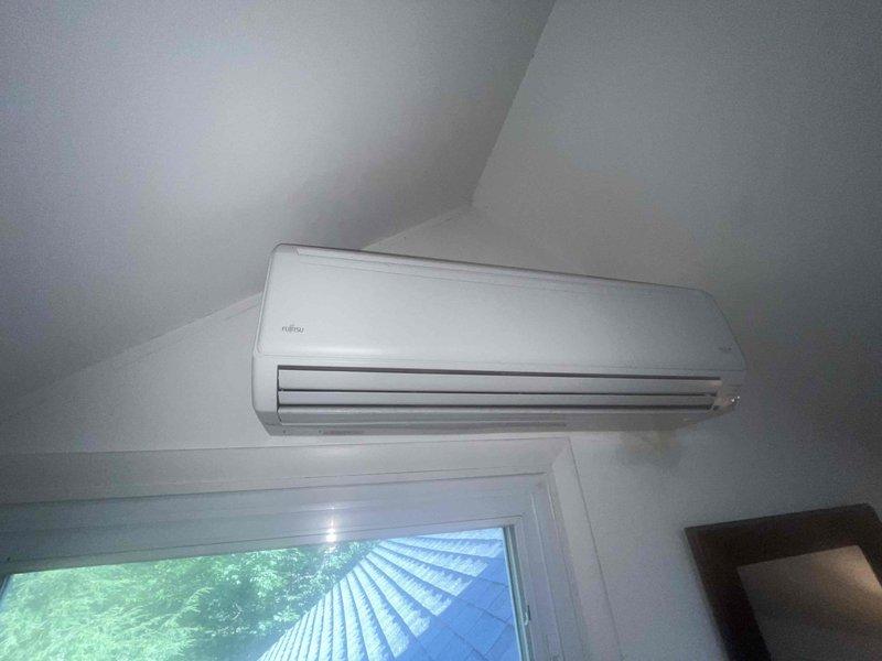 Performed comprehensive deep cleaning service on wall-mounted Fujitsu ductless mini-split system located in upper-floor room. Thoroughly cleaned internal components, filters, and exterior housing to restore optimal airflow and system efficiency.