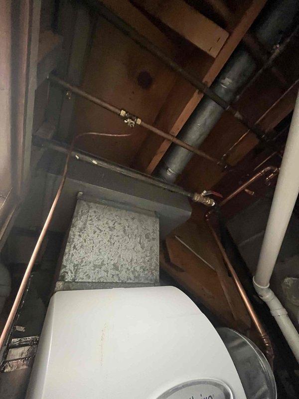 Completed comprehensive HVAC assessment for ductwork modifications and system airflow balancing. Evaluated existing mechanical infrastructure in utility space, including air handler unit, ductwork configuration, and return air pathways. Documented current system layout with focus on potential dual-zone return installation to improve airflow distribution throughout residence. Identified stairwell area as candidate location for additional return air grille to enhance system performance and temperature control. Provided detailed estimate for ductwork modifications with recommendations for AC replacement consideration based on system evaluation findings.