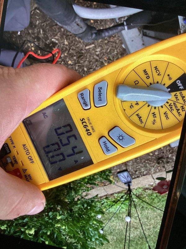 # HVAC Maintenance - Club Visit Summary

Completed routine cooling system maintenance as part of recurring membership service. Performed electrical diagnostics and measurements on outdoor condensing unit, recording voltage readings of 25.0V and subsequent readings of 25.7V and 11.0V using calibrated digital multimeter. Inspected rooftop HVAC equipment and verified proper electrical operation. System operational and within normal parameters upon completion of maintenance visit.
