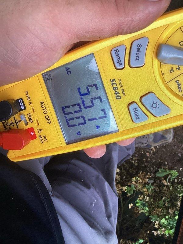 # HVAC Maintenance - Club Visit Summary

Completed routine cooling system maintenance as part of recurring membership service. Performed electrical diagnostics and measurements on outdoor condensing unit, recording voltage readings of 25.0V and subsequent readings of 25.7V and 11.0V using calibrated digital multimeter. Inspected rooftop HVAC equipment and verified proper electrical operation. System operational and within normal parameters upon completion of maintenance visit.