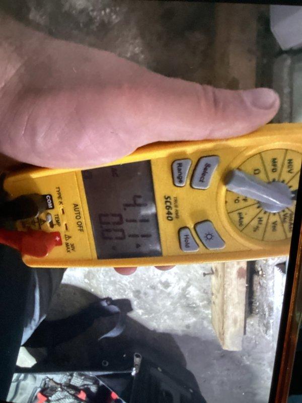 Completed routine air conditioning maintenance and club visit inspection. Performed electrical system diagnostics using digital multimeter to verify proper voltage and capacitor function, inspected internal wiring connections and control components, and documented equipment condition with photos. All electrical connections, capacitor, and control circuits found to be operating within normal parameters.