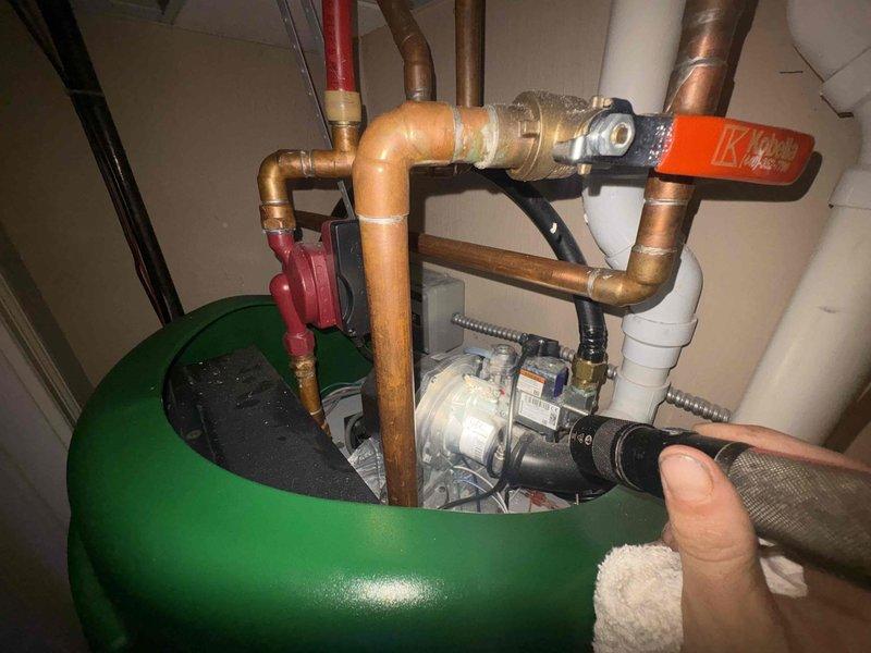 Responded to emergency service call for scalding hot water at all fixtures throughout residence. Upon inspection, identified malfunctioning mixing valve and recirculation system on tanked water heater installation in thirty-year-old home. Adjusted temperature control settings, tested water temperature at multiple fixtures including bathroom sink to verify safe operational range, and confirmed proper system function before completing service.