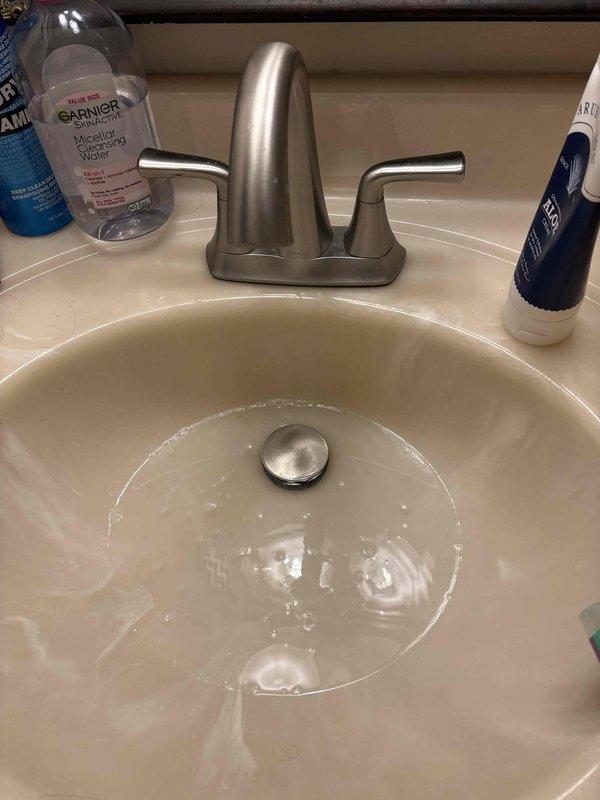 Responded to emergency service call for scalding hot water at all fixtures throughout residence. Upon inspection, identified malfunctioning mixing valve and recirculation system on tanked water heater installation in thirty-year-old home. Adjusted temperature control settings, tested water temperature at multiple fixtures including bathroom sink to verify safe operational range, and confirmed proper system function before completing service.