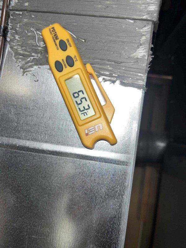 Completed routine cooling maintenance visit and system performance evaluation. Measured supply air temperature at 53.3°F using calibrated digital thermometer on supply duct, confirming proper cooling output. Recorded static pressure differential of -0.401" using digital manometer to verify airflow and system operation within acceptable parameters. All measurements indicate system is operating efficiently with adequate cooling capacity and proper air distribution.