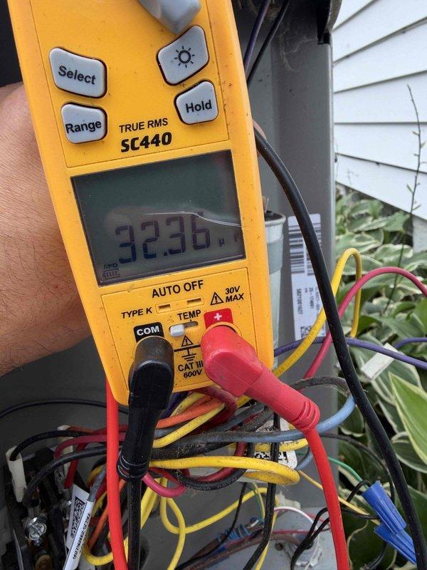 Completed cooling maintenance club visit on residential HVAC system. Performed system inspection, replaced heavily soiled air filter that showed significant dust and debris accumulation, and conducted electrical diagnostics on outdoor condensing unit with multimeter reading 323.6 volts at control board. All maintenance tasks completed per membership agreement specifications.