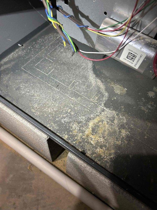 Performed comprehensive tune-up and inspection on Goodman outdoor condensing unit and indoor air handler system. Documented existing dust accumulation on interior components and verified proper electrical connections throughout system. All operational parameters checked and unit confirmed to be functioning within manufacturer specifications for continued reliable performance.