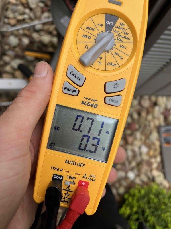 Completed prepaid cooling maintenance visit for air handler system. Performed electrical diagnostics using clamp meter, recording amperage draw of 5.10A and voltage readings of 0.71A/0.3V to verify proper system operation and component functionality. All measurements within normal operating parameters for equipment.